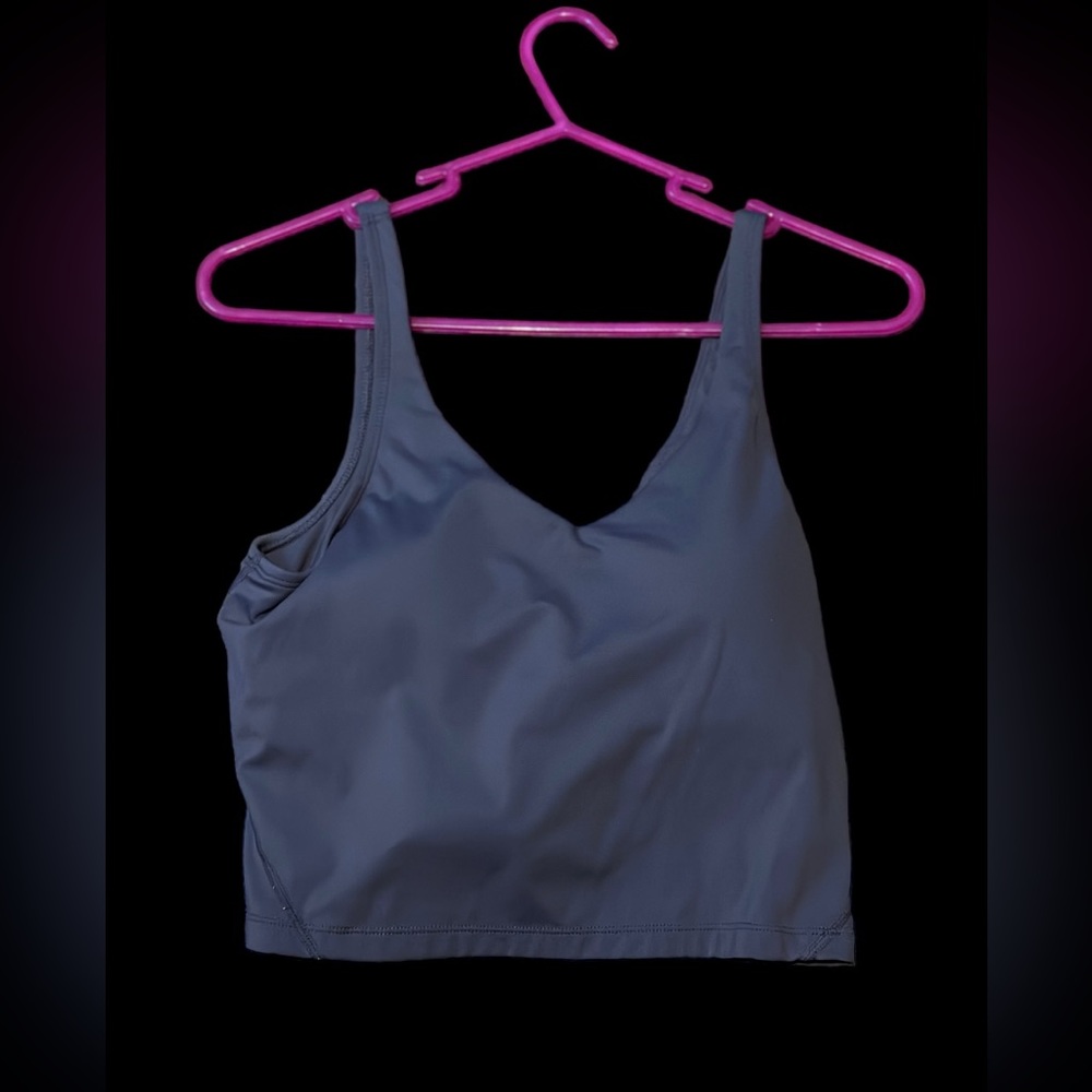 Tank top with padding built in size Medium.Can be used for fancy or casual/fancy
